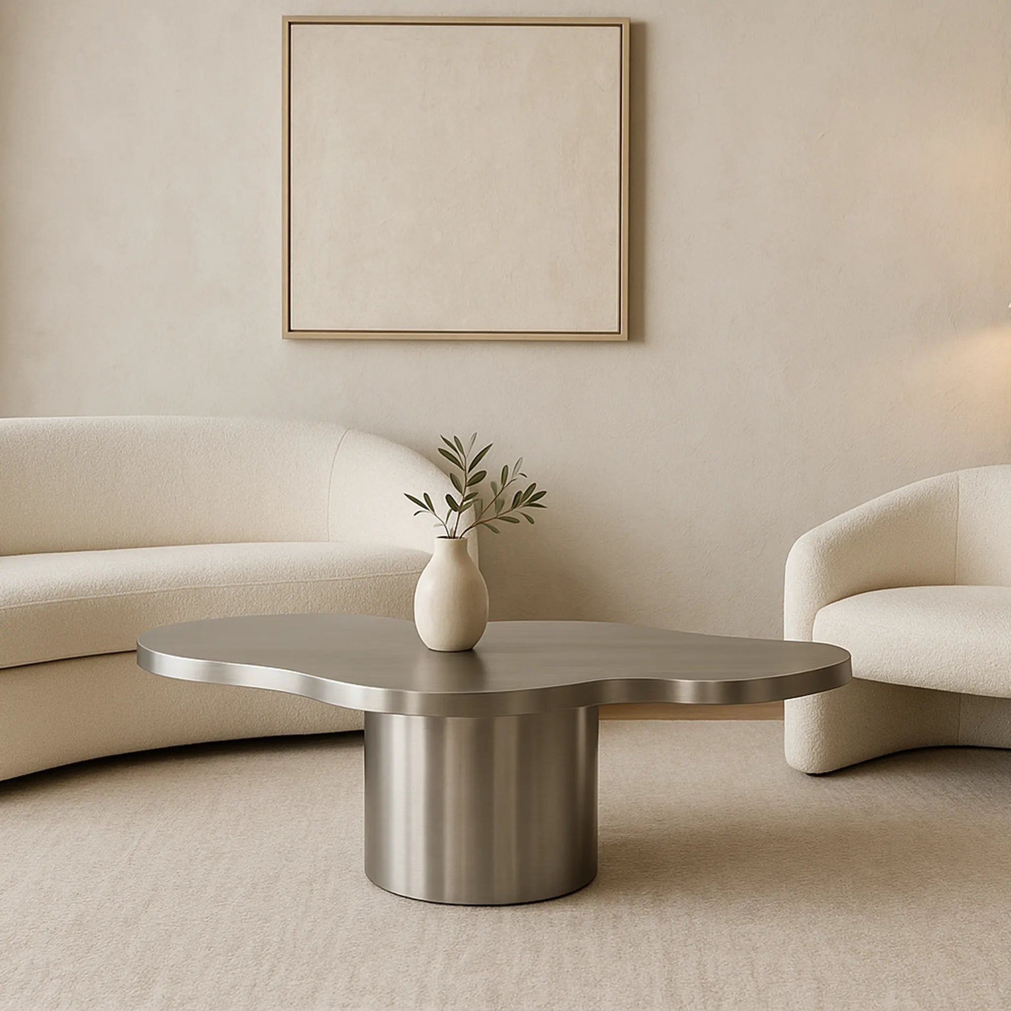 Brushed stainless steel Jamie Coffee Table adds a touch of luxury to your home décor, perfect for any contemporary living room.