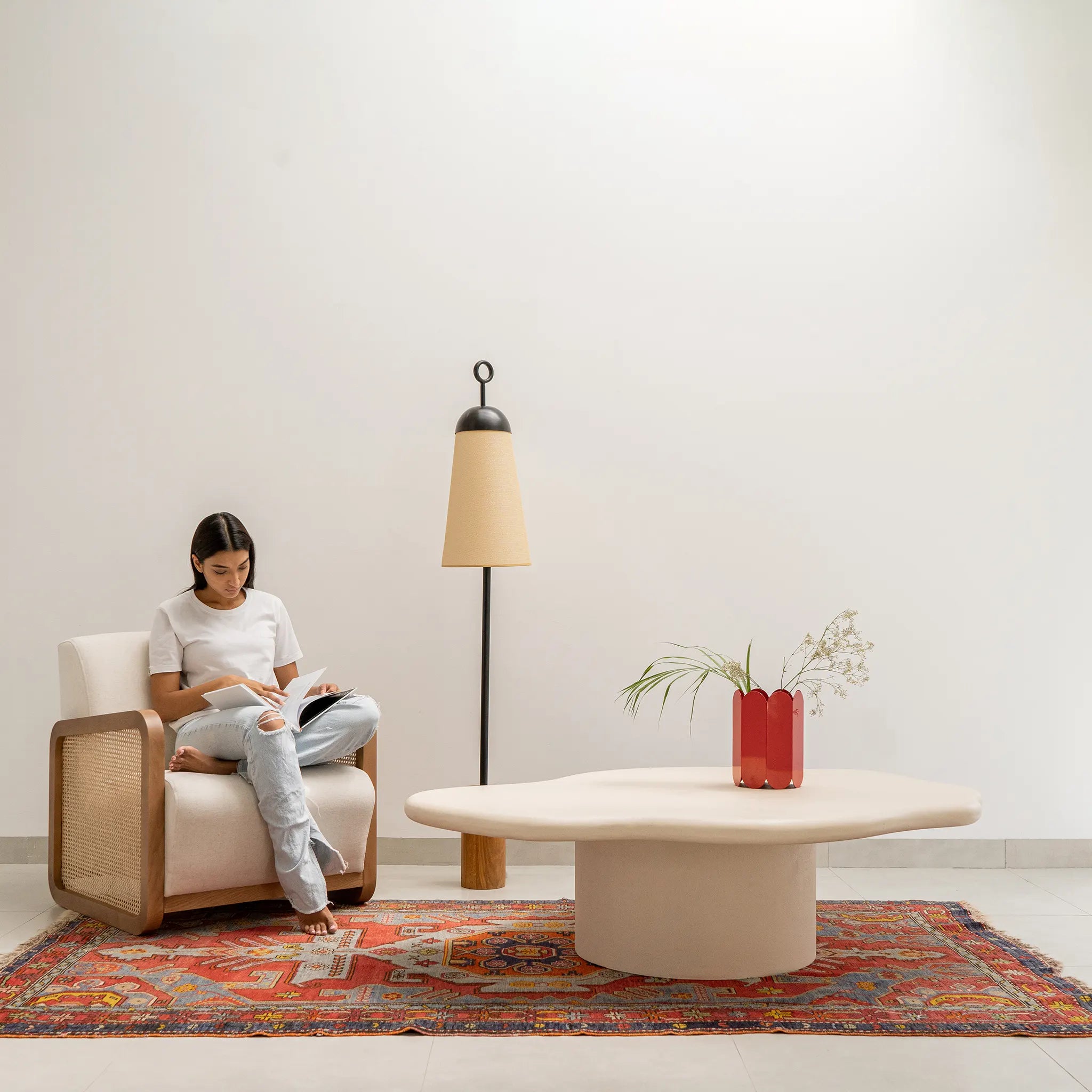 Styled in a contemporary Dubai living room, The Jamie Coffee Table exudes elegance with its round glass top and minimalist silhouette – a luxury round coffee table Dubai homeowners will love.