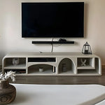 Load image into Gallery viewer, The Eden TV unit with storage styled in a family room, offering ample space for toys and media.