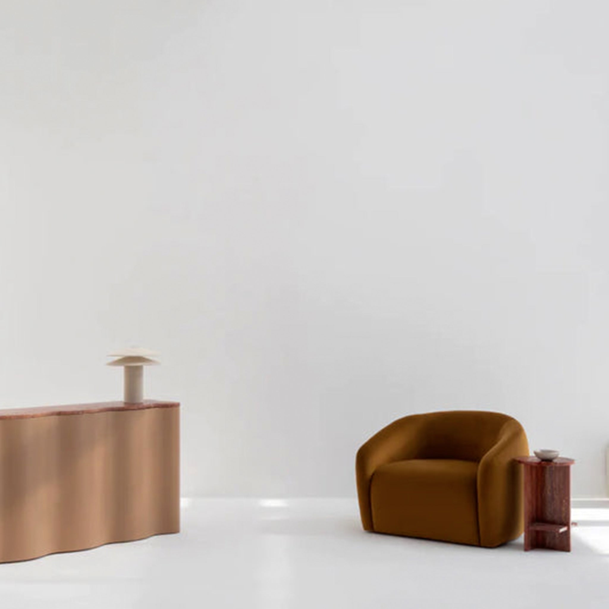 Wooden chair and round table with a geometric rug in a room with a white wall. small accent chair