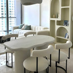 Load image into Gallery viewer, The Claudia round dining chair with a soft seat, offering a perfect blend of comfort and style.