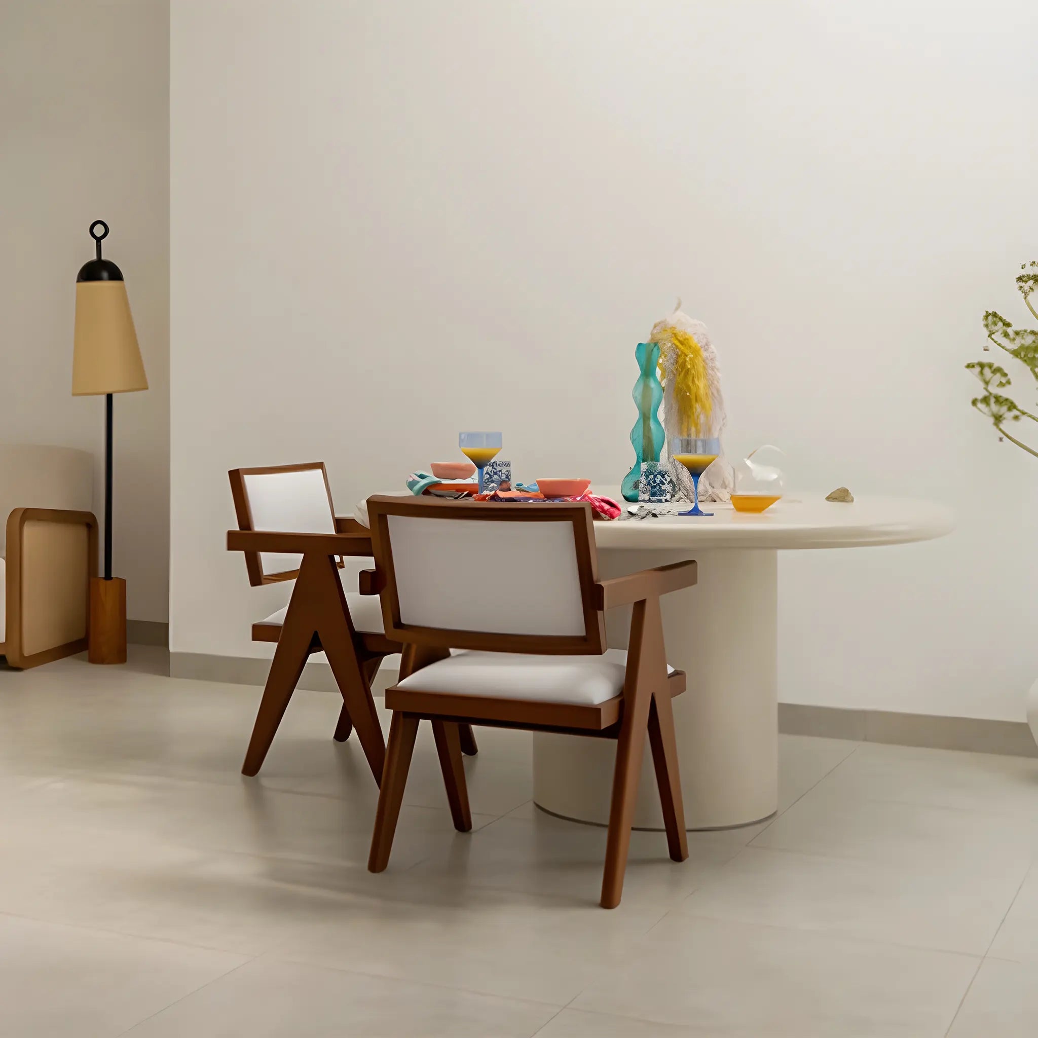 The Marx round dining table, blending seamlessly into a modern dining room with its timeless design.