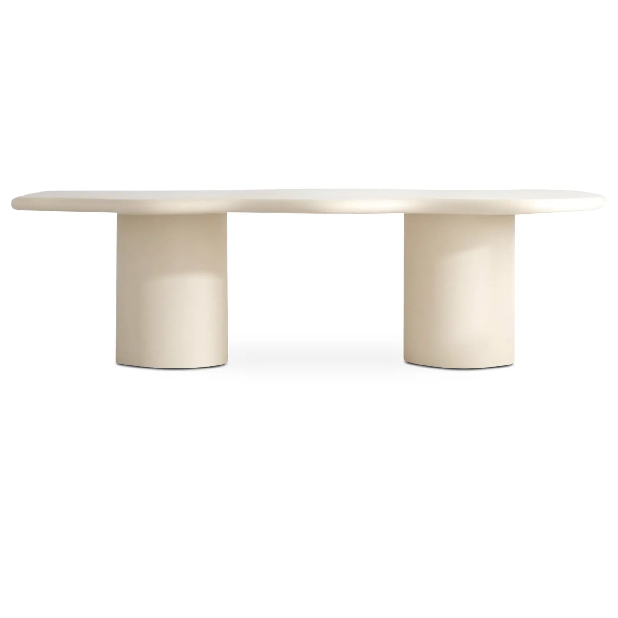 The Victoria Curvy 6 seater dining table in microplaster, perfect for modern and spacious dining rooms.