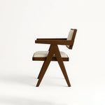 Load image into Gallery viewer, The Pierre dining chair with a solid wood frame, adding a rustic yet refined touch to any dining area.