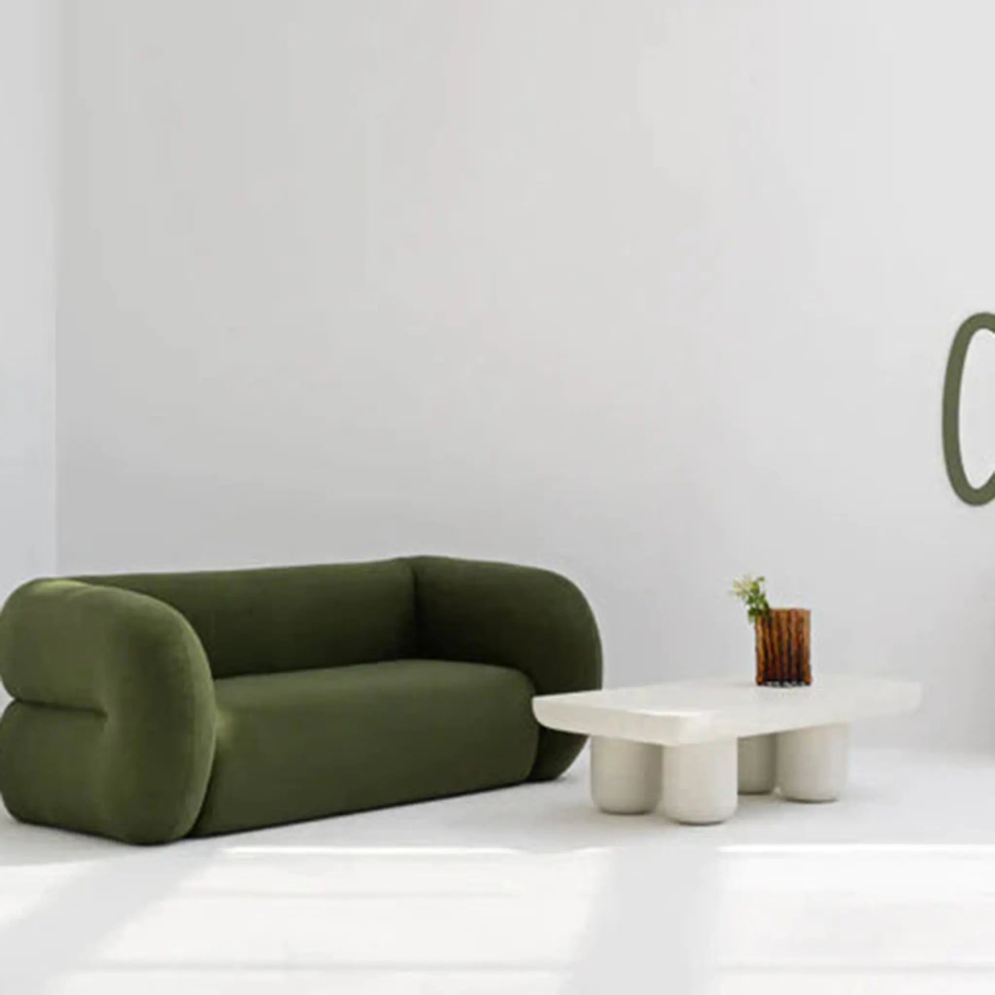 A stylish living room showcasing the modern white coffee table, bringing a light and airy feel to any space.