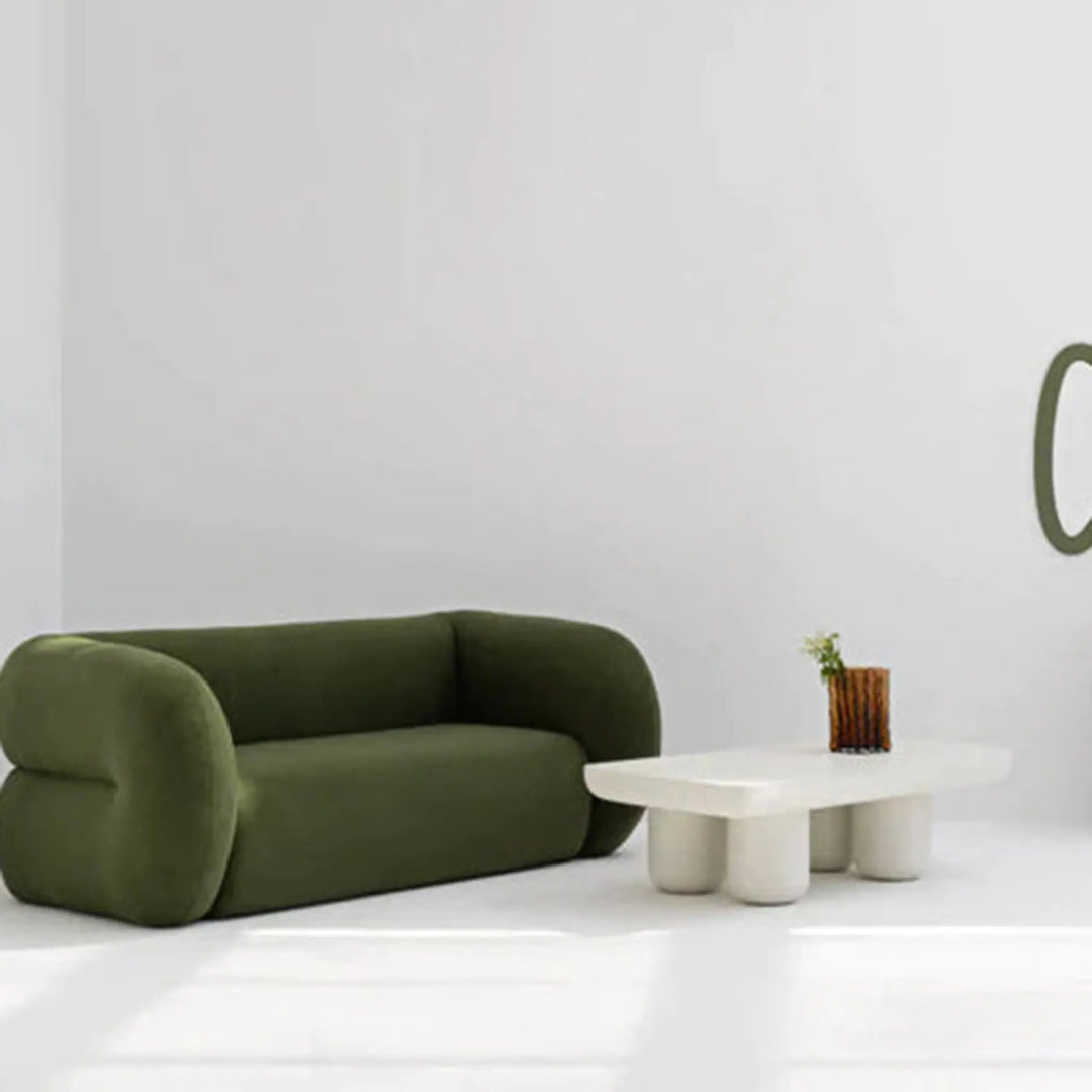 A stylish living room showcasing the modern white coffee table, bringing a light and airy feel to any space.