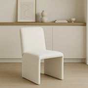 The Carl two leg chair adding a touch of modern elegance to a chic living room setup.