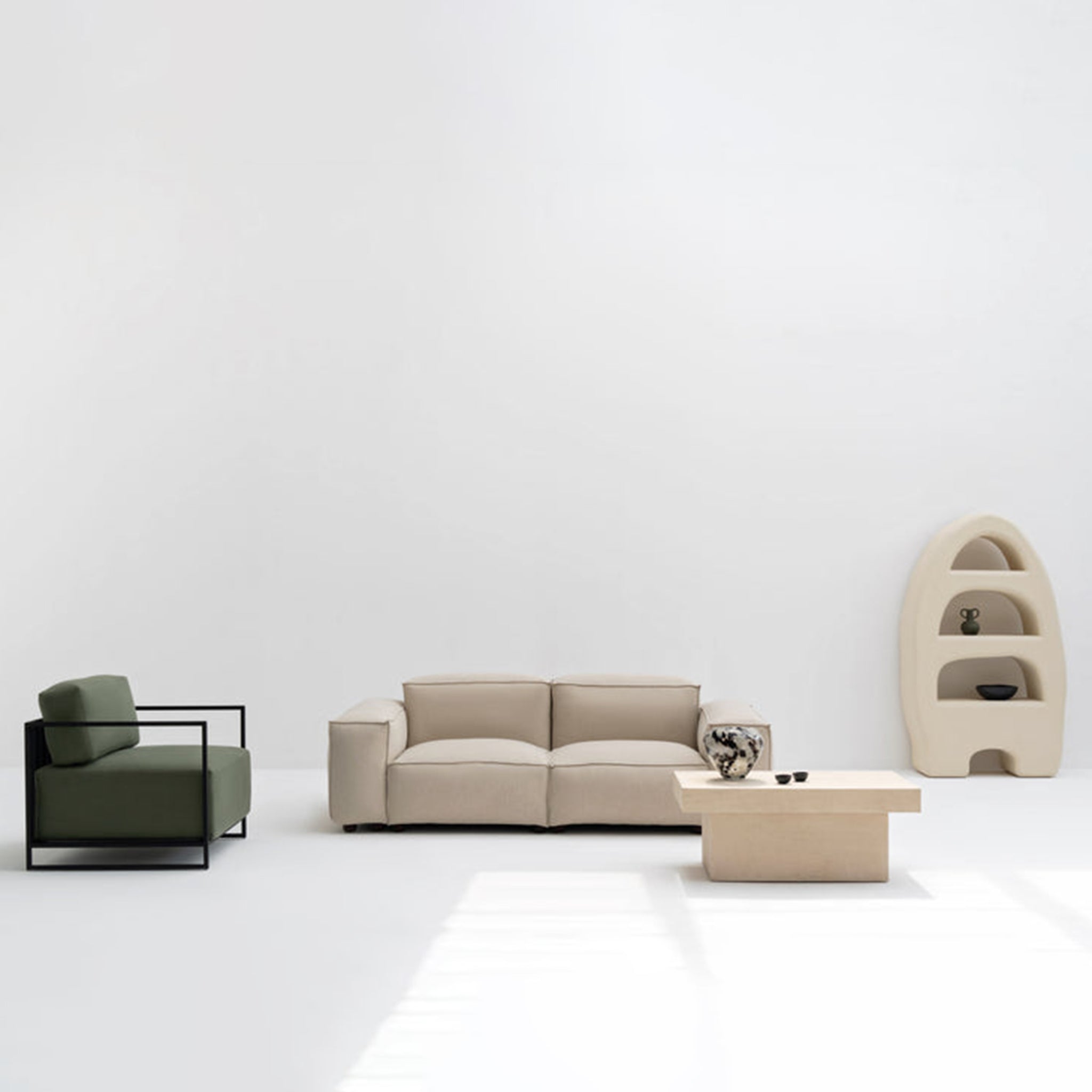 Elegant beige couch with clean lines and modern design in a minimalist setting