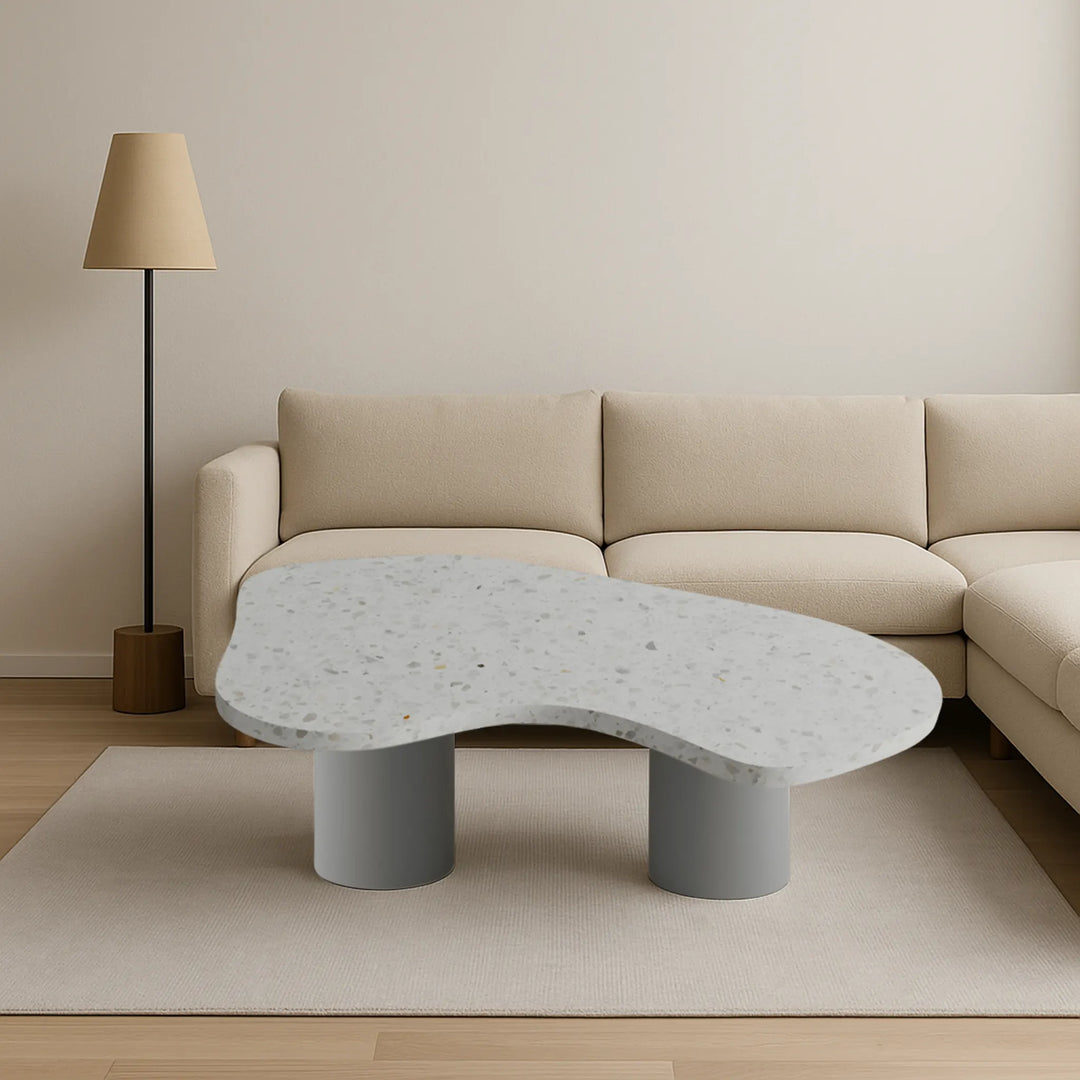 Set atop dark wooden floors, The Eliza Coffee Table’s white marble top adds sophisticated contrast – a luxurious white marble coffee table for curated spaces.