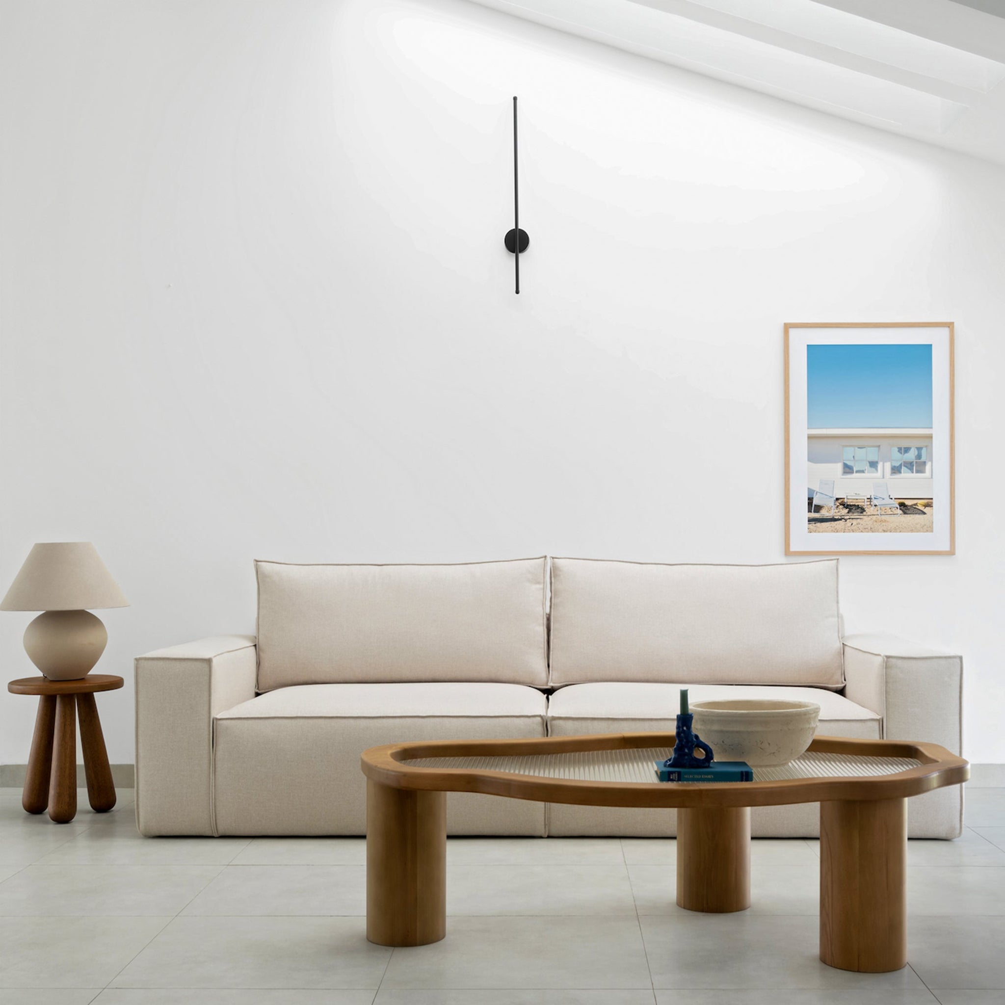 Stylish sofa with soft cushions featured in a minimalist living room setup in Dubai.