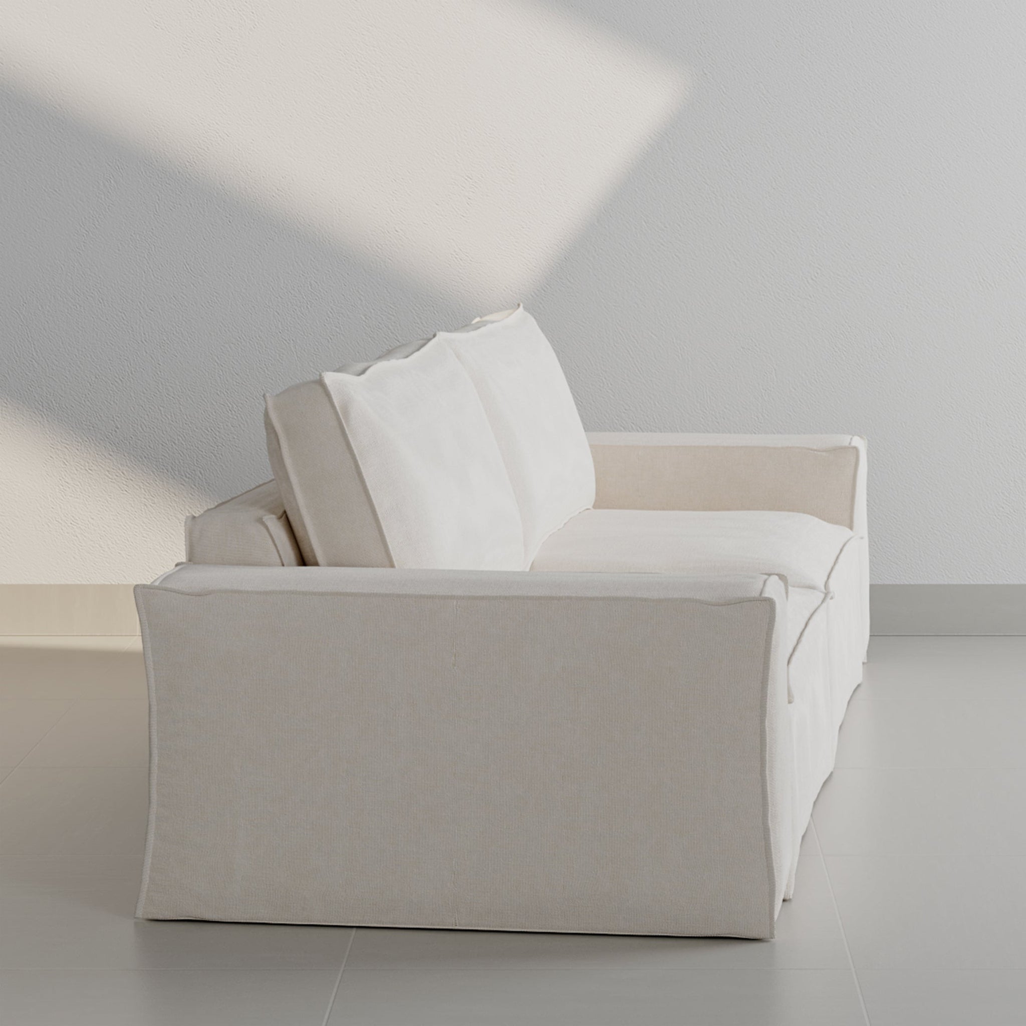 Stylish sofa with a minimalist look, featuring the Gavin design on a grey background.