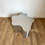 Load image into Gallery viewer, Stainless Steel Coffee Table in a chic living room, adding a touch of elegance and modern appeal to your space.
