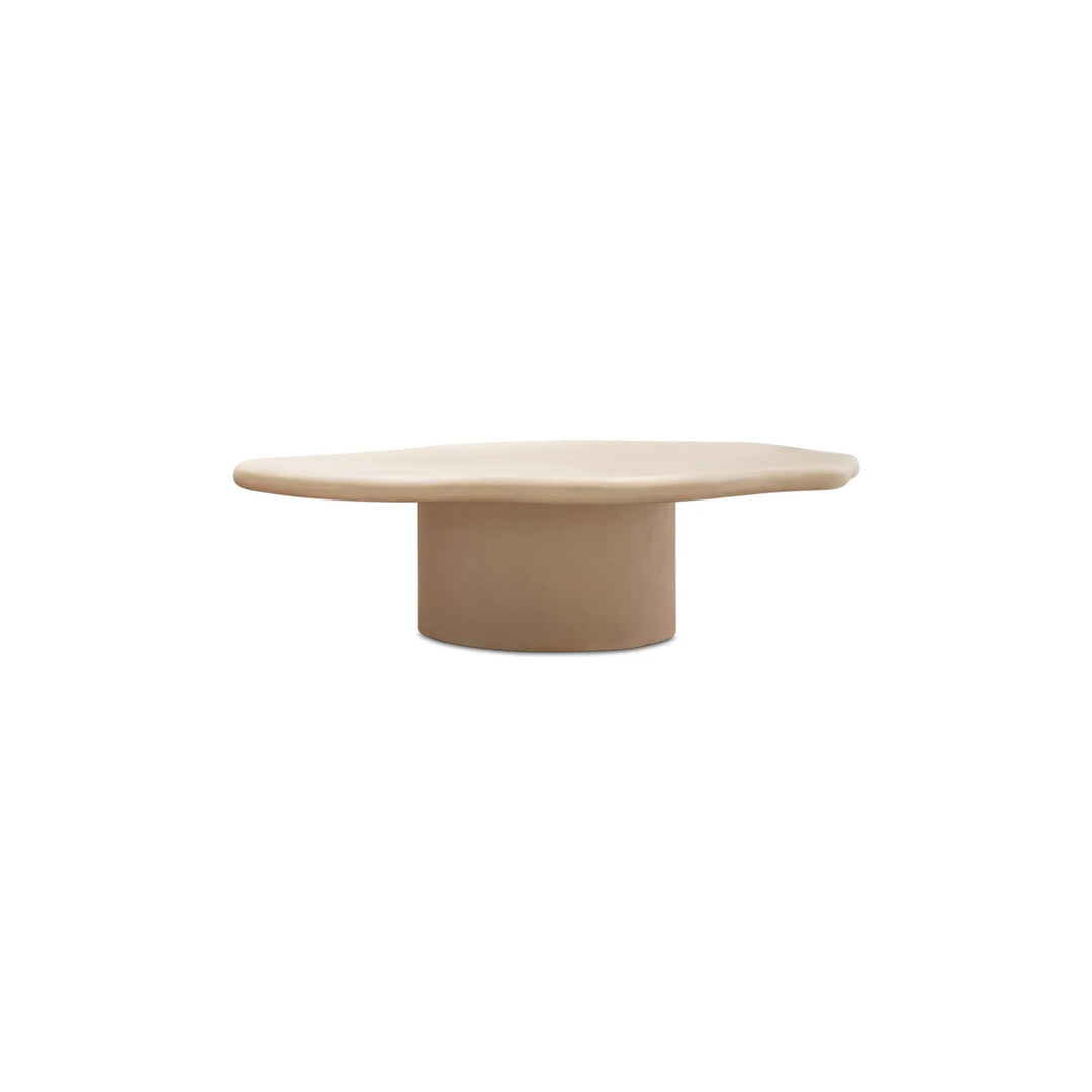 The Jamie Coffee Table in a clean white-on-white space, showcasing subtle textures and airy design – a minimalist round coffee table UAE modernists will adore.
