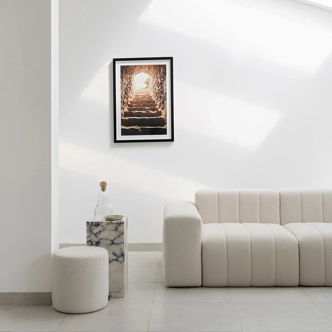 Roomy and stylish, this four seater sofa by Klein elevates modern living spaces.