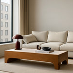 Load image into Gallery viewer, Modern low coffee table, The Noah, seamlessly integrates into the lifestyle scene, highlighting its adaptability and aesthetic appeal.
