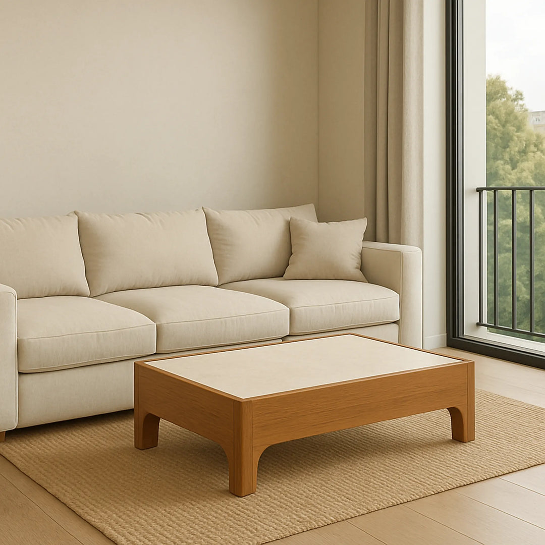 Low square wood coffee table, The Noah, complements the surrounding decor in this lifestyle image, offering both utility and elegance.
