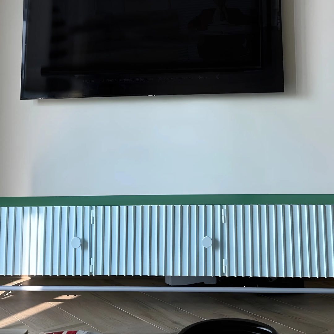 Stylish TV stand with storage, ideal for keeping living spaces clutter-free.