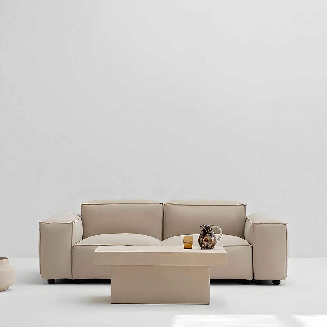 Spacious square coffee table with a stone effect, providing a stylish centerpiece for your outdoor area.

