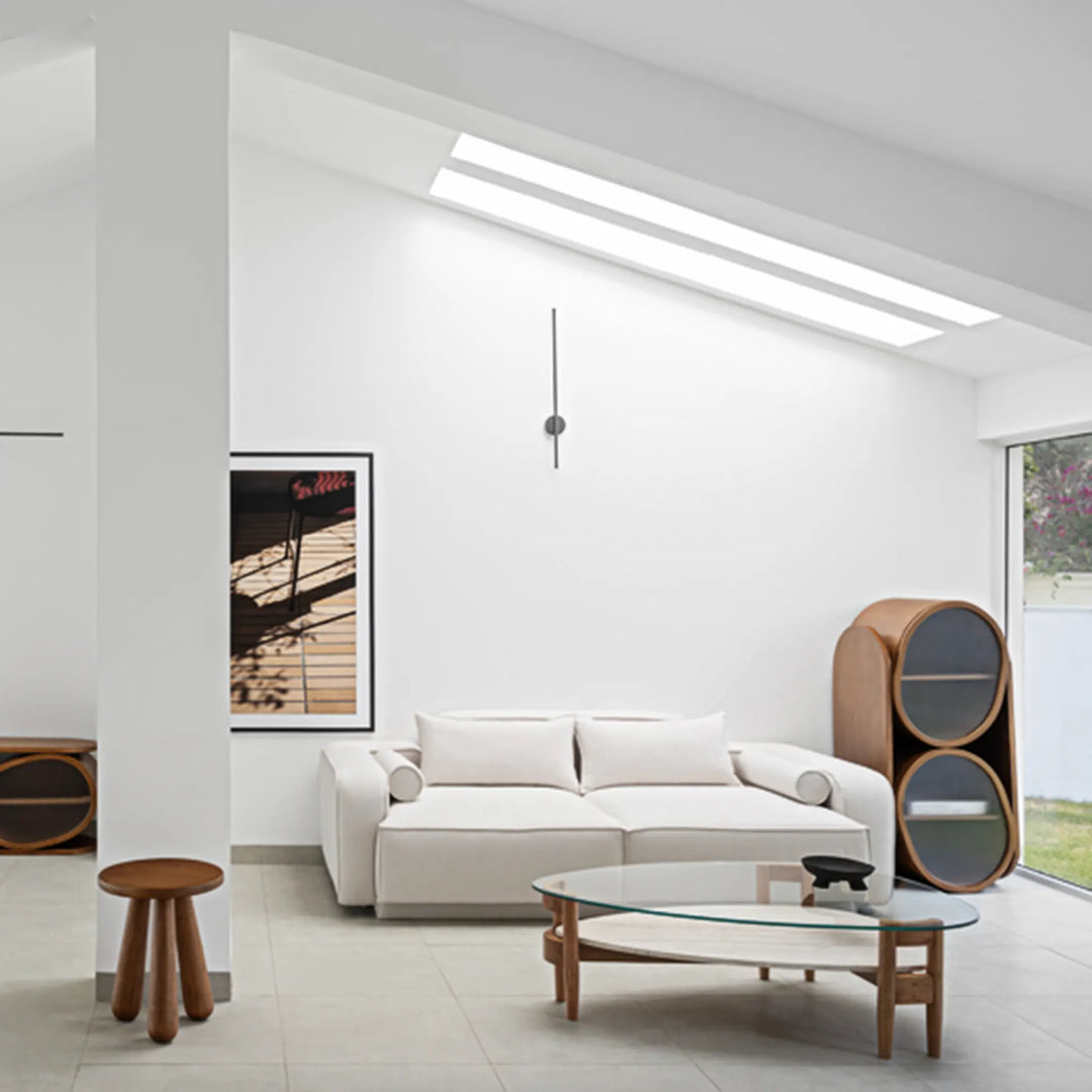 The Scott Coffee Table complements cozy living spaces with its sleek round glass top and solid wood structure, offering both style and everyday function.