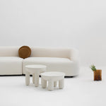 Load image into Gallery viewer, Textured surface detail of modern microplaster coffee table, cozy interior view
