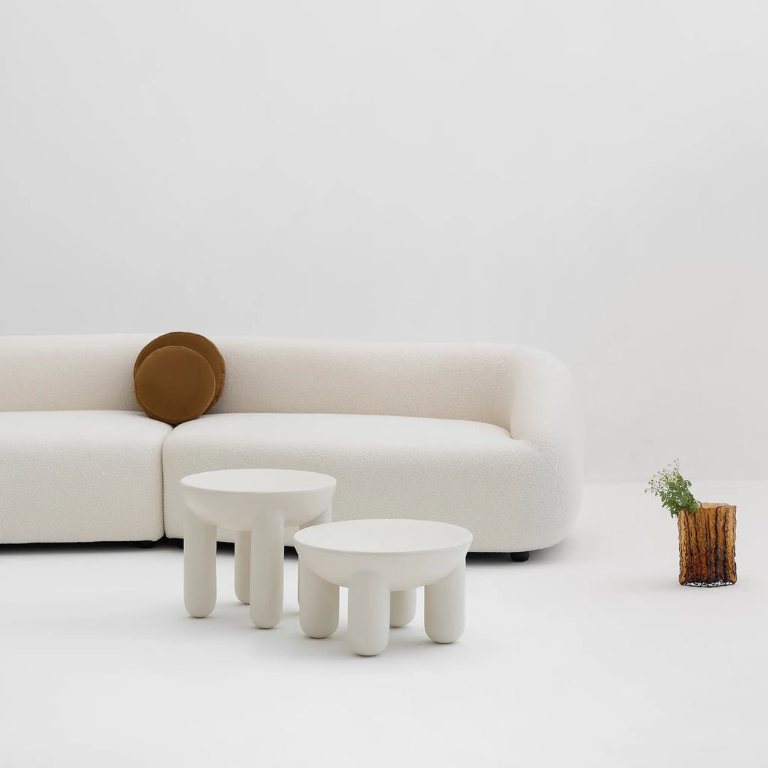 Textured surface detail of modern microplaster coffee table, cozy interior view