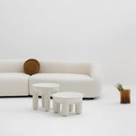 Load image into Gallery viewer, Detailed view of the sleek, minimalist white round coffee table, showcasing its elegant finish and modern style.
