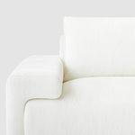 Load image into Gallery viewer, The Sylvia modern white sofa, a seamless blend of style and functionality for modern living.
