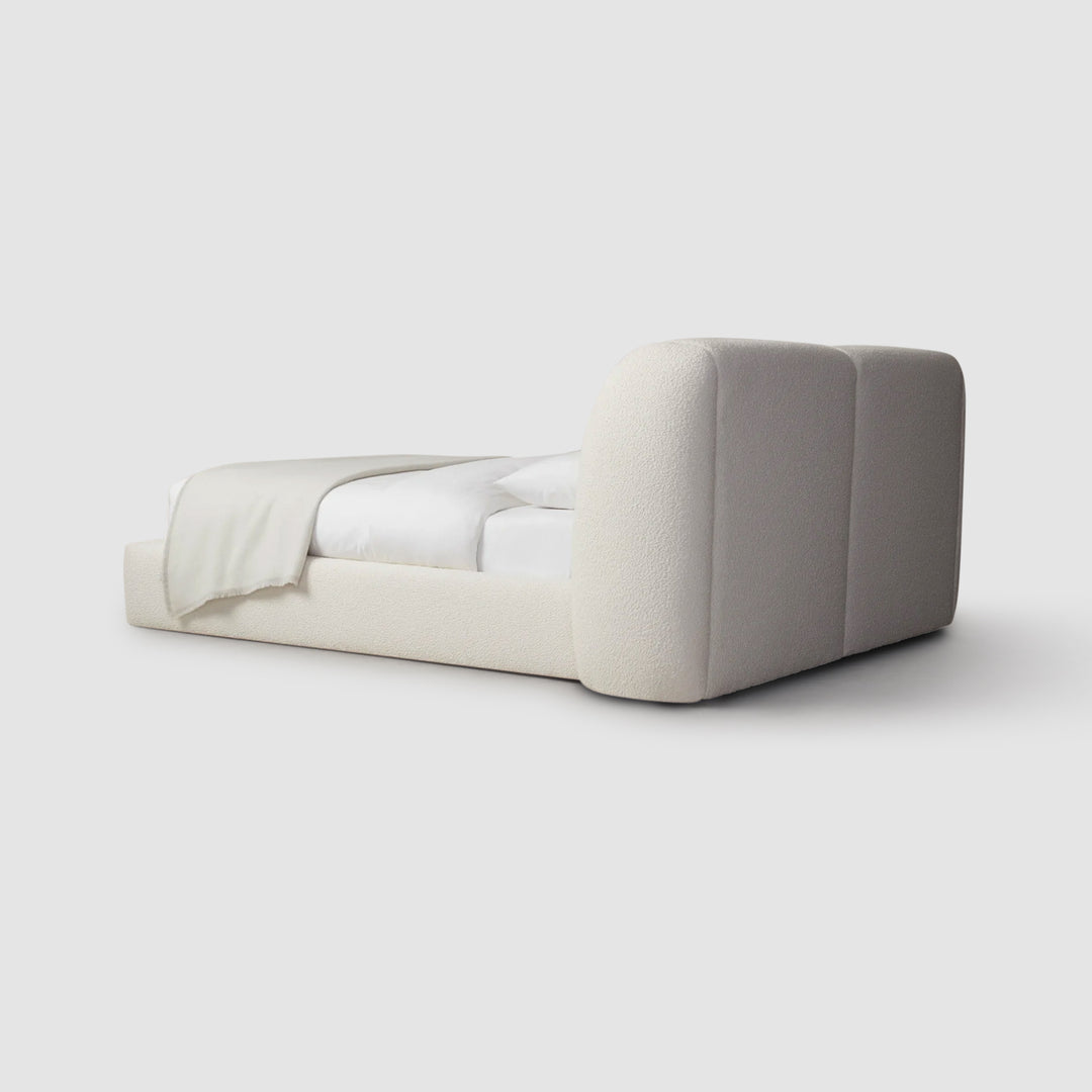 Simple and sophisticated, the Ashley white platform bed creates a serene sleeping space. luxury bedding