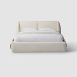 Load image into Gallery viewer, White platform bed with crisp white bedding on a white backdrop. luxury bedding
