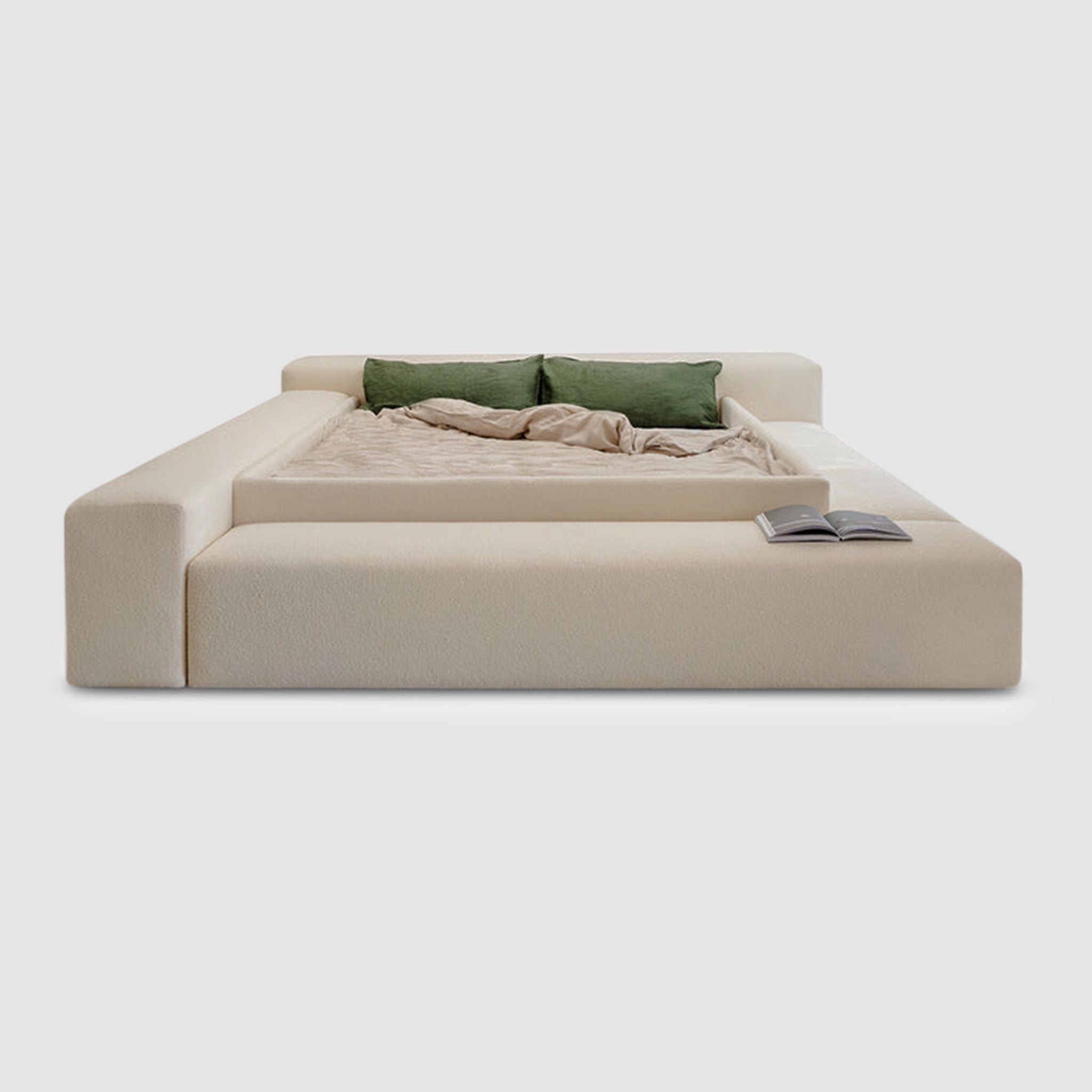 Plush, biscuit-tufted gray bed with integrated seating on two sides. The Heff Bed by Klettkic offers a space-saving solution for modern bedrooms, perfect for reading, relaxing, or changing shoes.