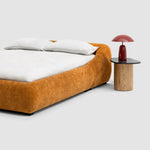 Load image into Gallery viewer, Sleek, charcoal gray king-size platform bed with a minimalist button-tufted headboard adds a modern touch to a light-filled bedroom. The Alain Bed by Klettkic is crafted from solid wood for lasting durability. buy beds in Dubai
