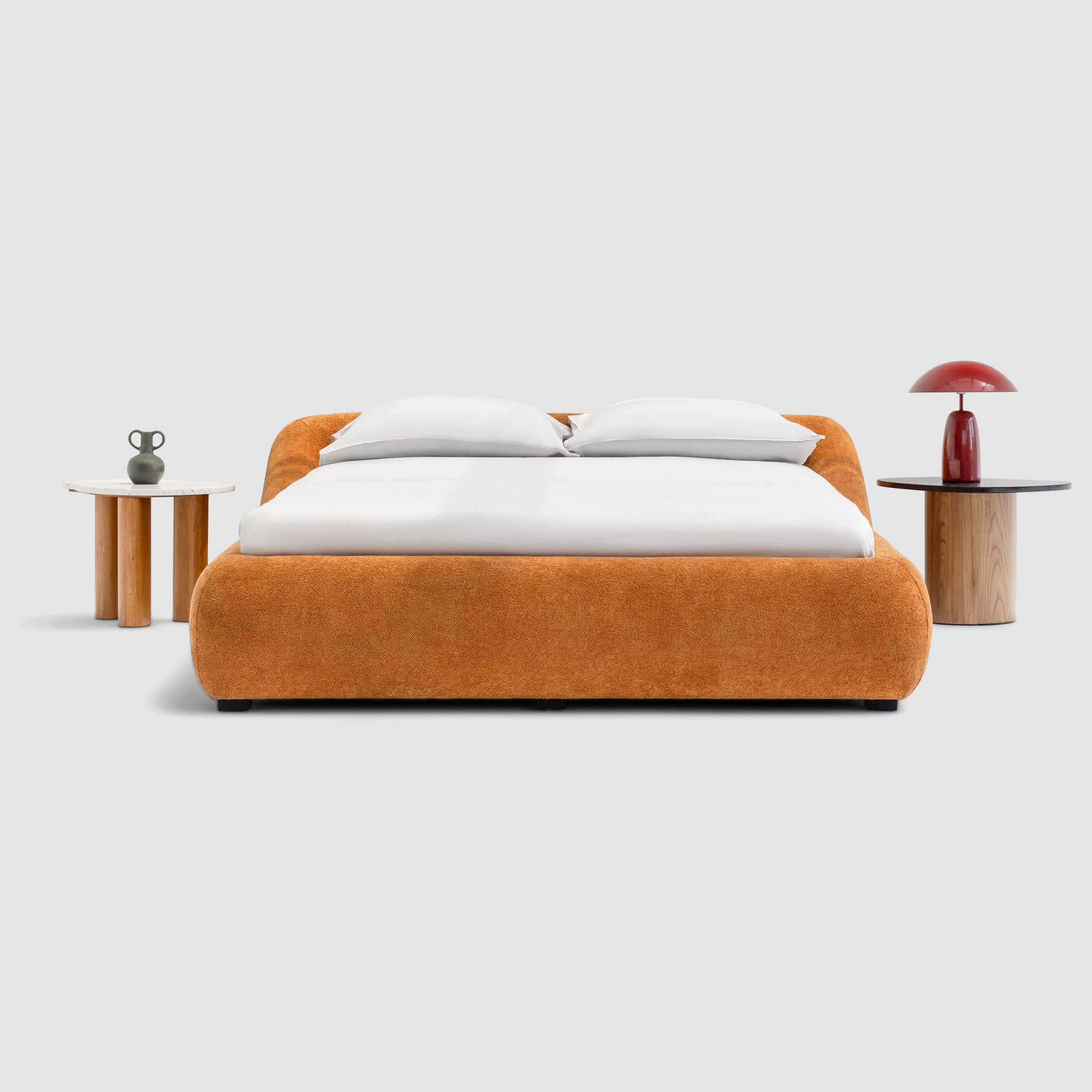 Sleek, low-profile platform bed with a minimalist headboard. The Alain Bed by Klettkic offers modern design in solid wood. Choose your upholstery for a personalized touch.