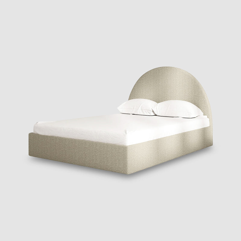 Modern and stylish Archie Bed with a curved light beige headboard.
