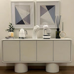 Load image into Gallery viewer, The Barb living room sideboard cabinet styled with modern decor, adding elegance to any space.
