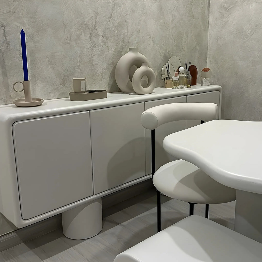 Functional Microplaster sideboard cabinet used as a storage solution in a contemporary home.