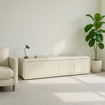 Load image into Gallery viewer, The Barb low TV unit styled in a chic living room, balancing practicality and elegance.
