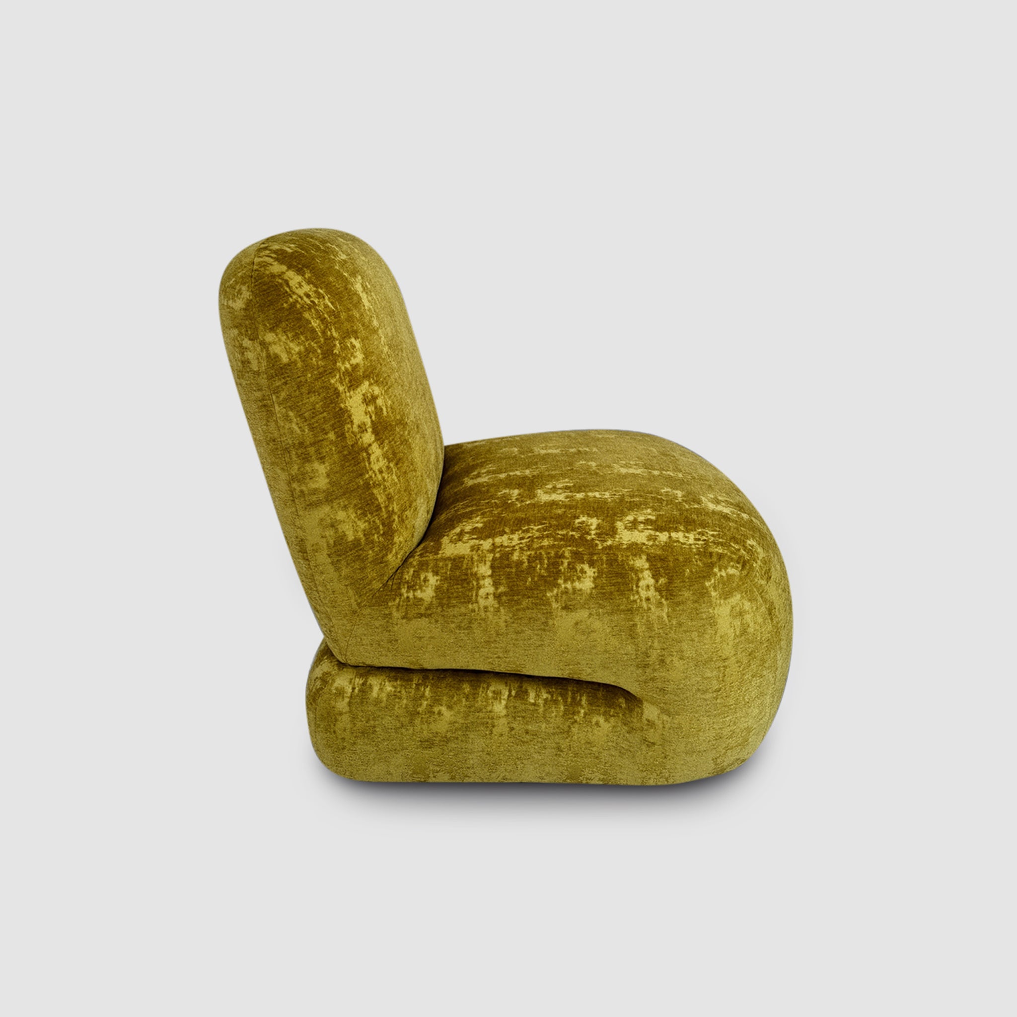 Side view of The Bopie Accent Chair with a plush, moss green velvet finish, showcasing its modern and comfortable design.