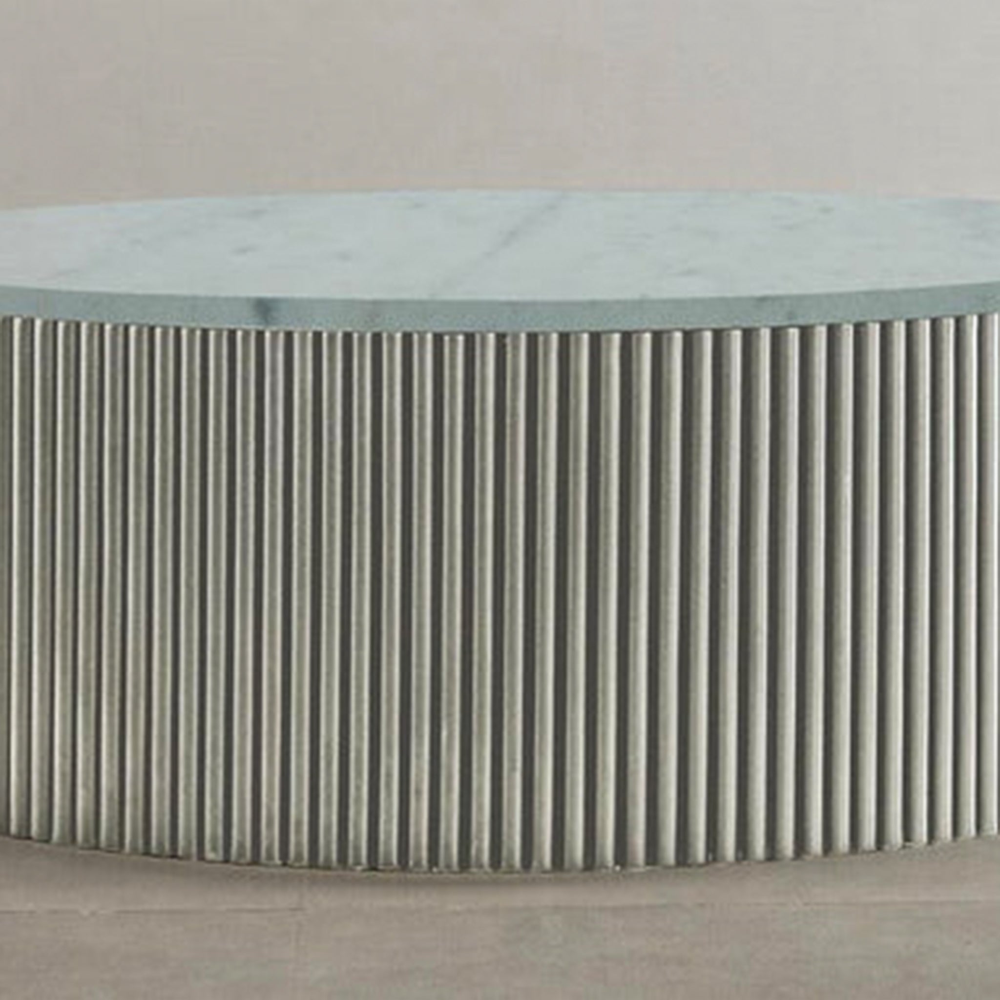 "Stylish ribbed coffee table with circular design"
