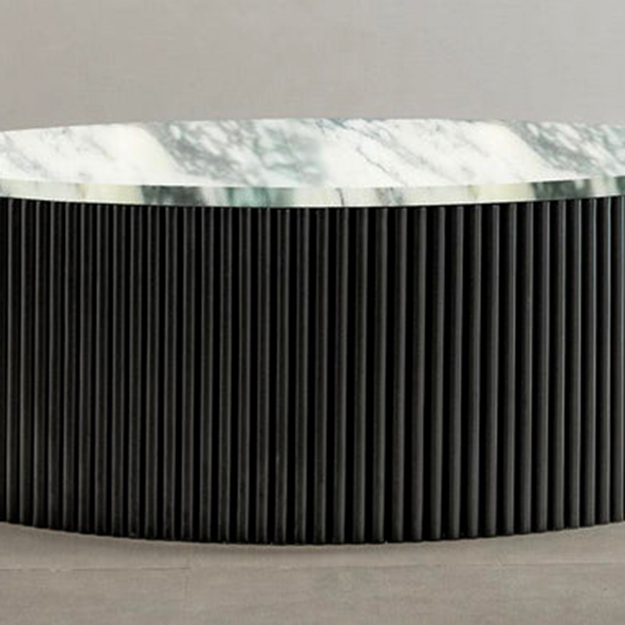 "Modern ribbed coffee table with round design"