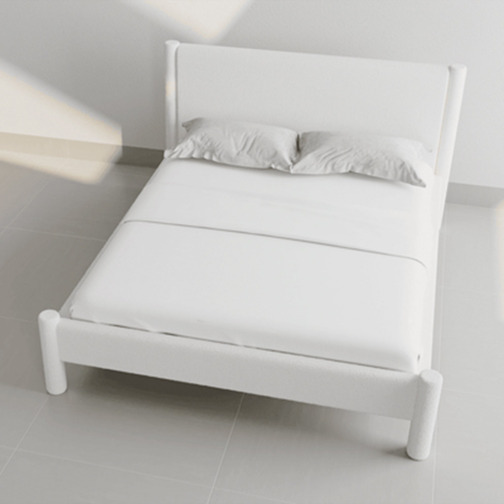 Fully upholstered Carrie Bed with solid beech wood foundation for durability.