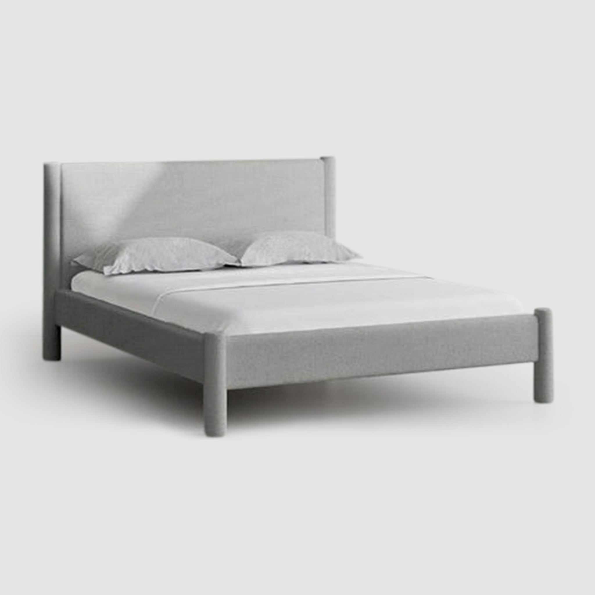 The Carrie Bed with solid beech wood frame and legs, perfect for modern bedrooms.