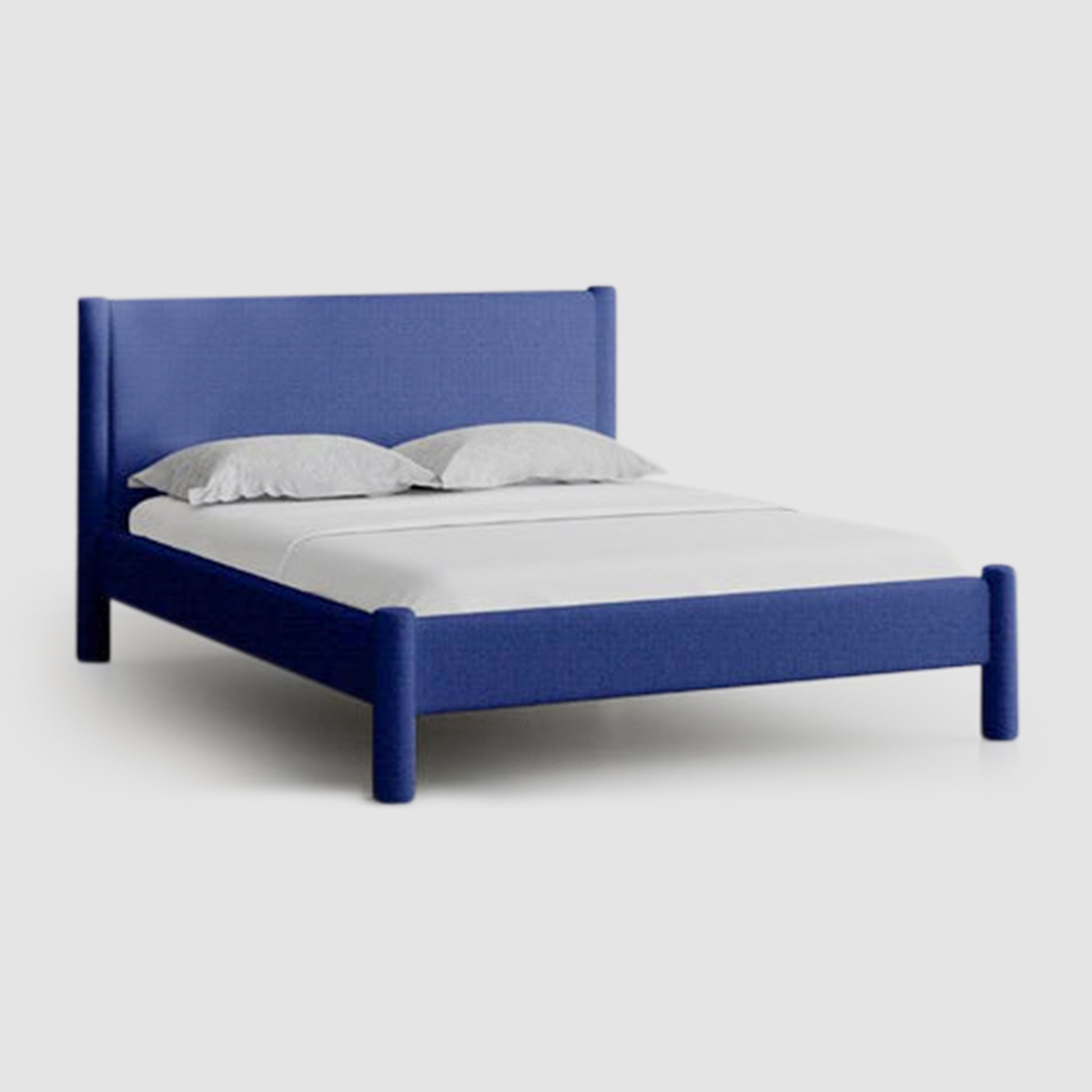 The Carrie Bed with robust beech wood frame, available in Queen, King, and Super King.