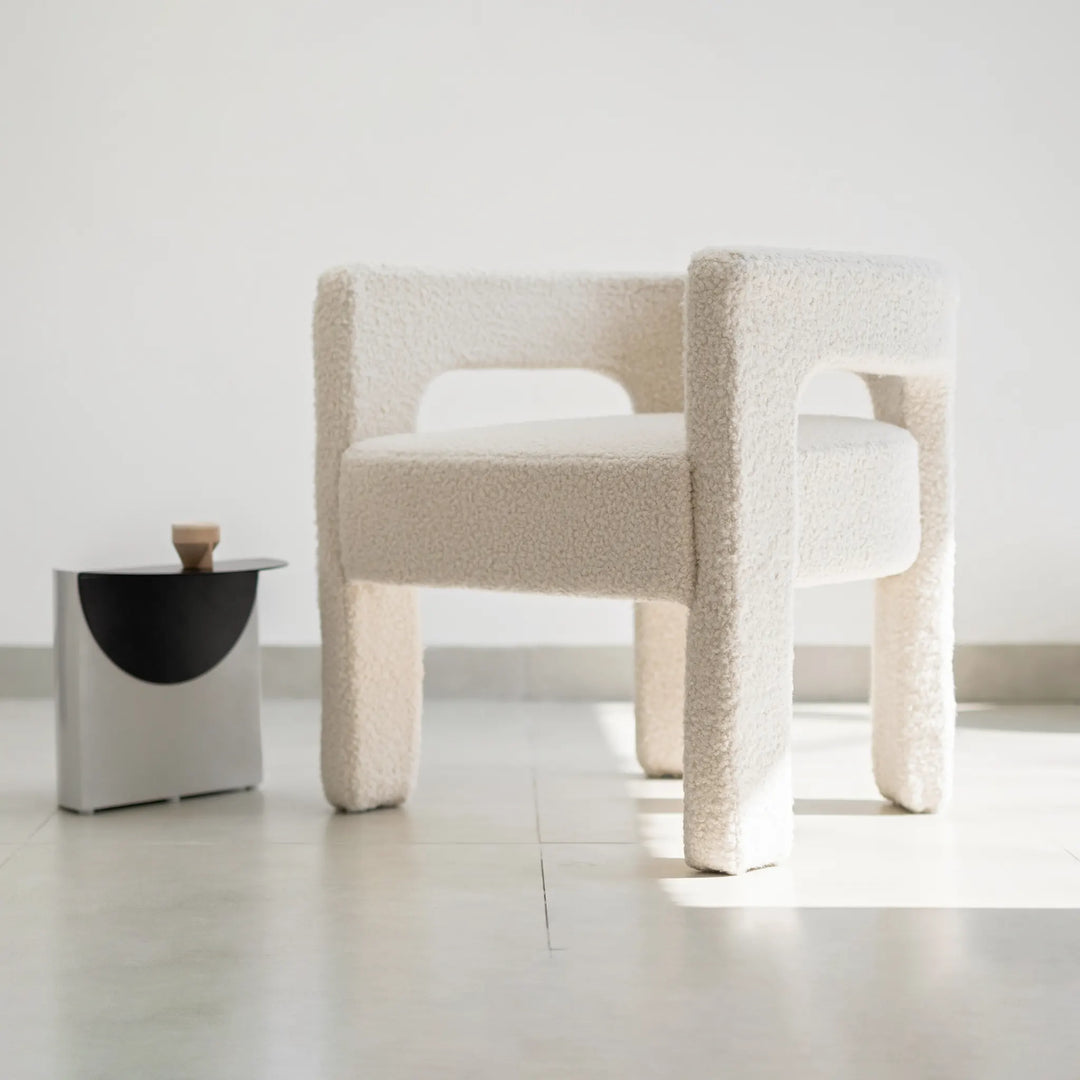 Durable Celeste Accent Chair with sturdy wooden legs, offering comfort and modern style, suitable for minimalist and contemporary interiors.