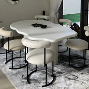 A modern round dining chair, adding a touch of sophistication to your dining room setup.
