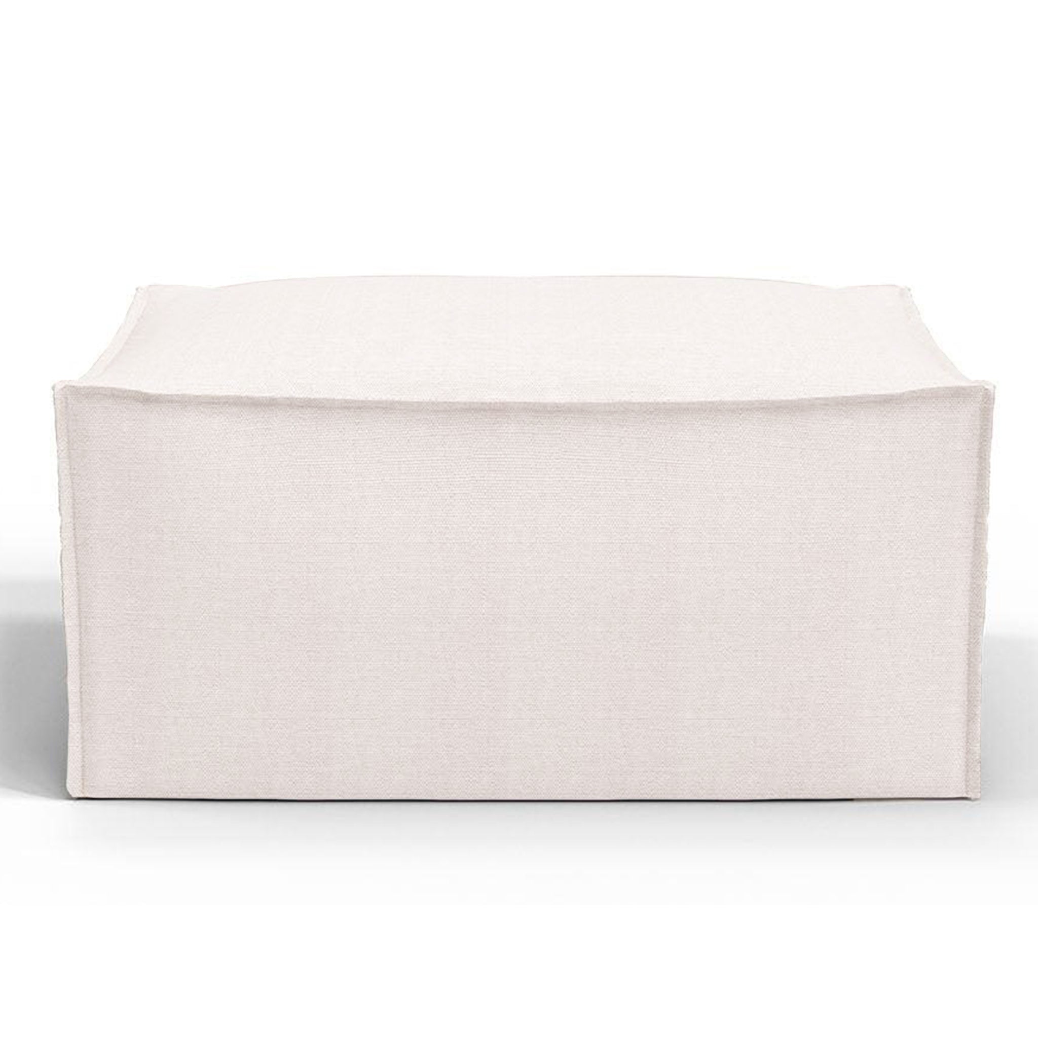 Light beige ottoman with a sleek, minimalist design, perfect for complementing modern living room decor and serving as versatile seating or a footrest.
