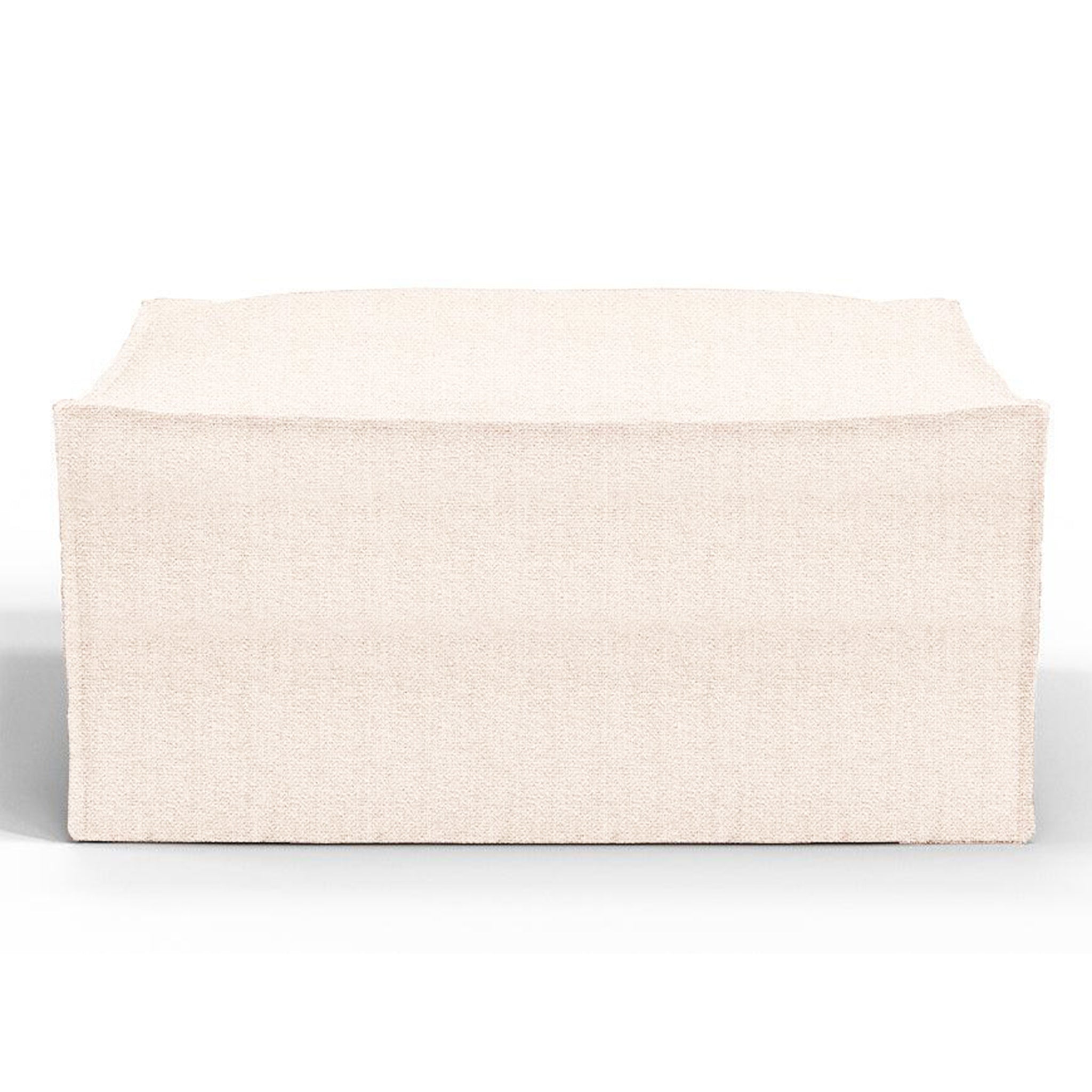 Modern peach-colored ottoman, perfect for adding a soft, elegant accent to contemporary interiors.