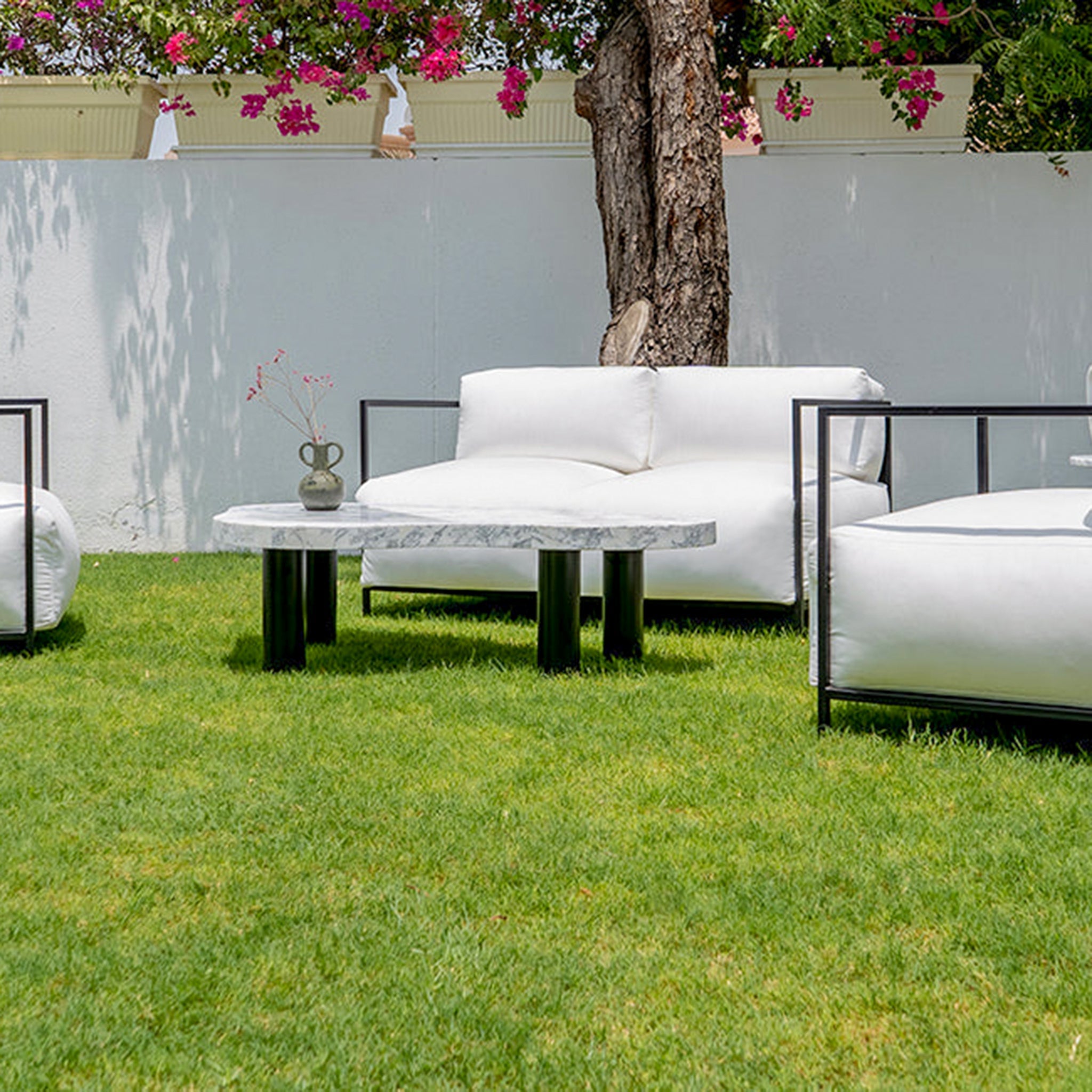 Relax in style on the Dexter, a modern three-seater outdoor sofa perfect for creating a comfortable patio retreat. 3 Seater Sofa