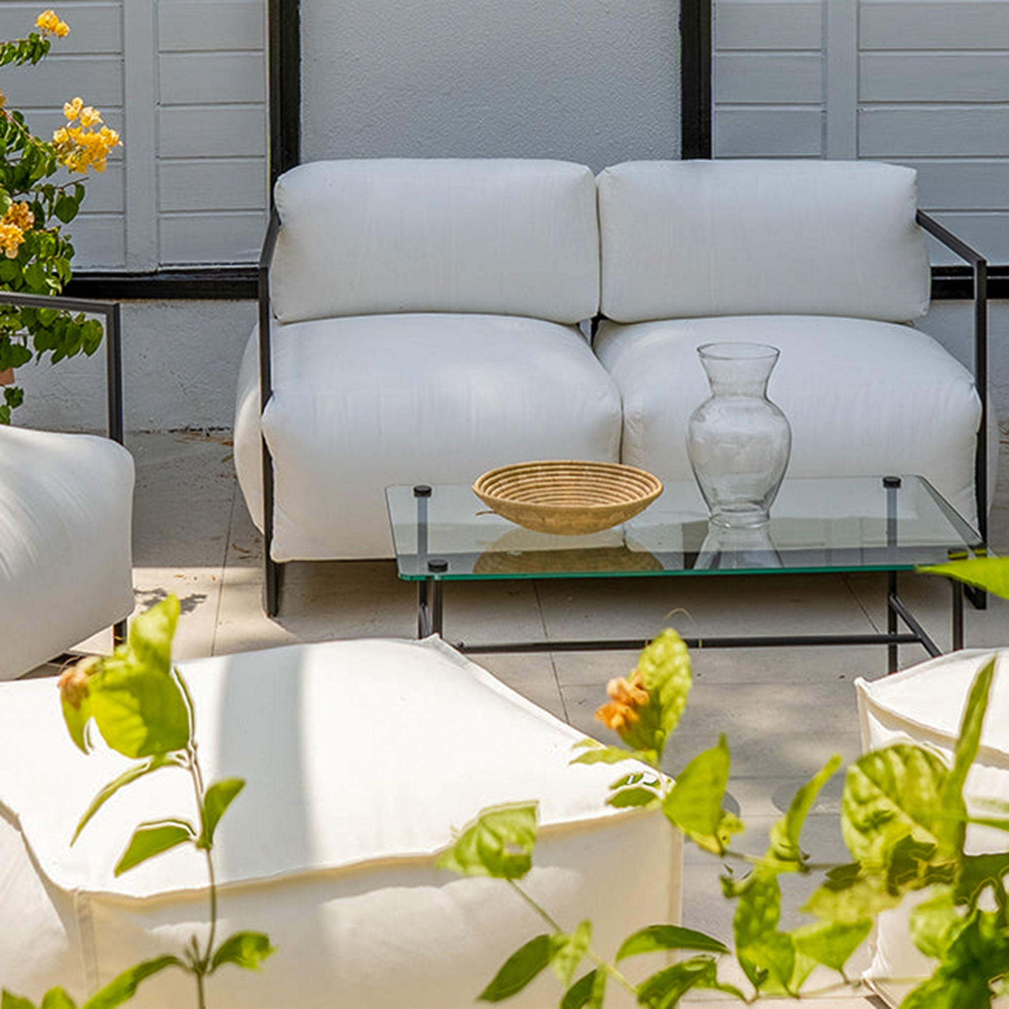 Bring comfort to your patio with the Dexter three-seater outdoor sofa. Built with a steel frame and weatherproof fabric for lasting enjoyment.