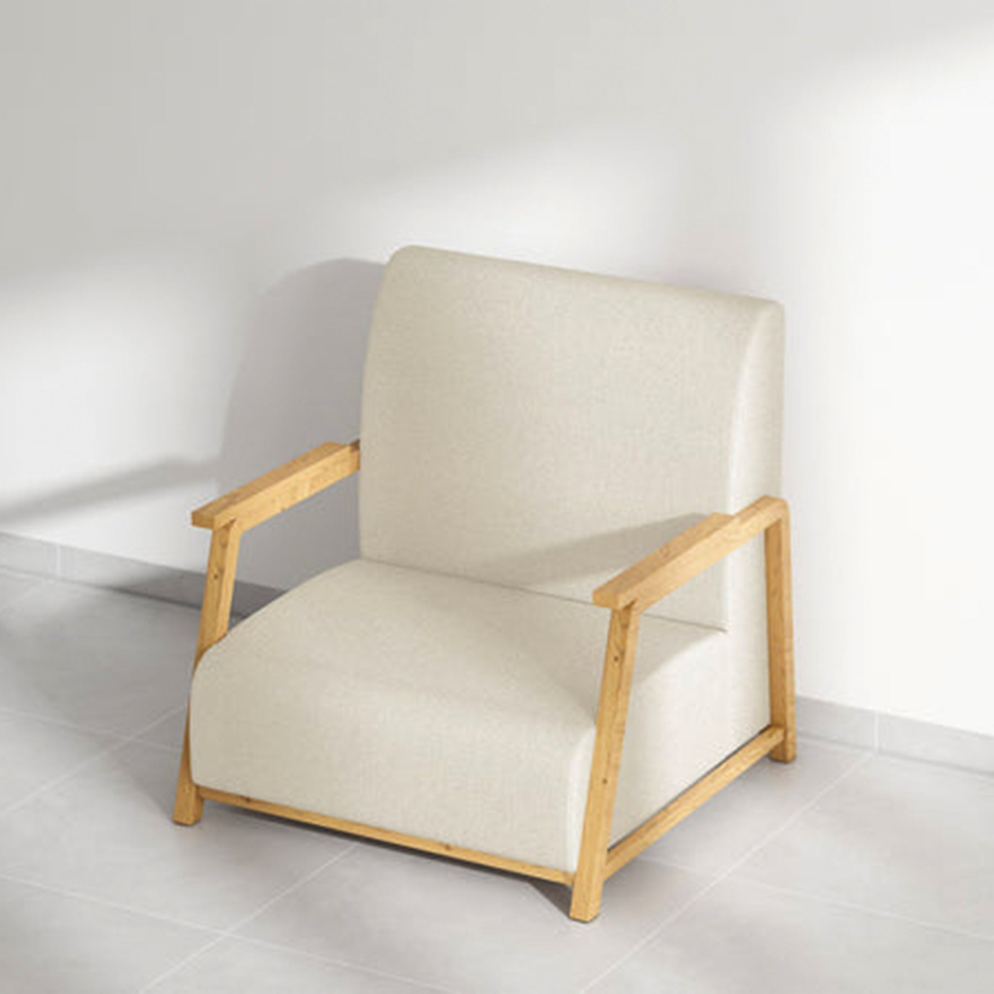 Elegant beige Dixon Arm Accent Chair in a sunlit room.