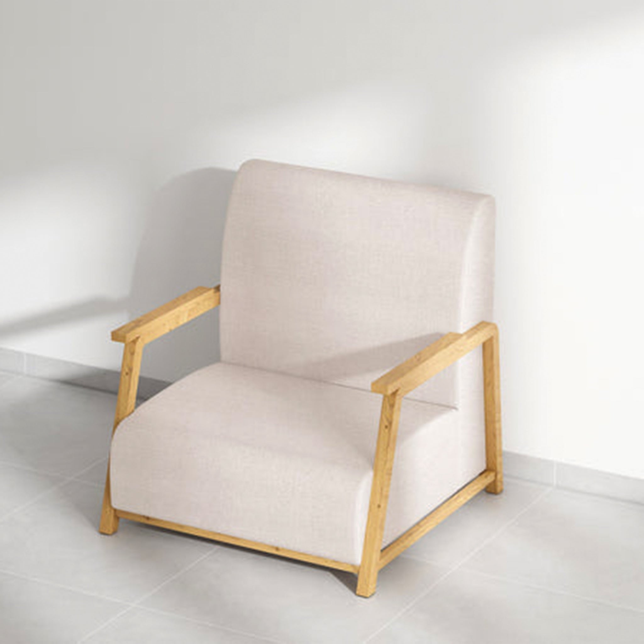 Sleek and minimalist Dixon Arm Accent Chair in a light-filled space.